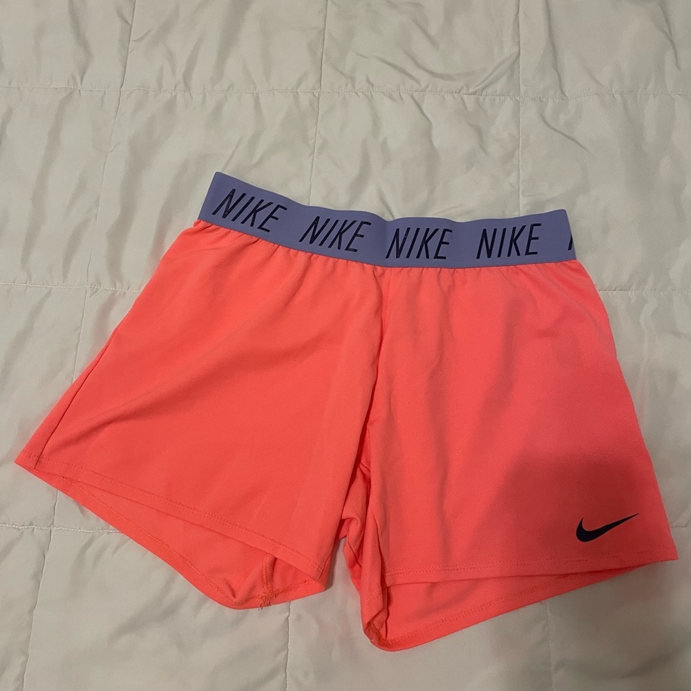 Pink Nike pros